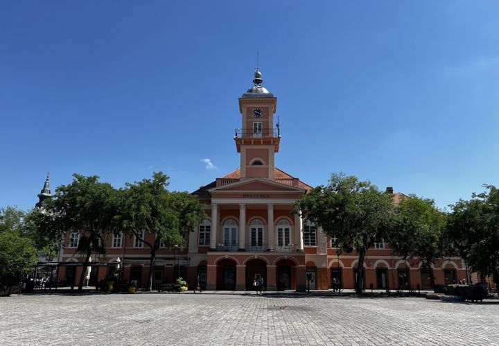 Sombor City Hall on Holy Trinity Square: a neoclassical portico, a clock tower and the date MDCCCXLII