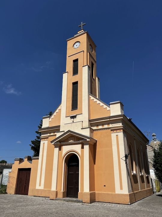 The orange Evangelical church in Sombor, the year 1901 on the gable above the door